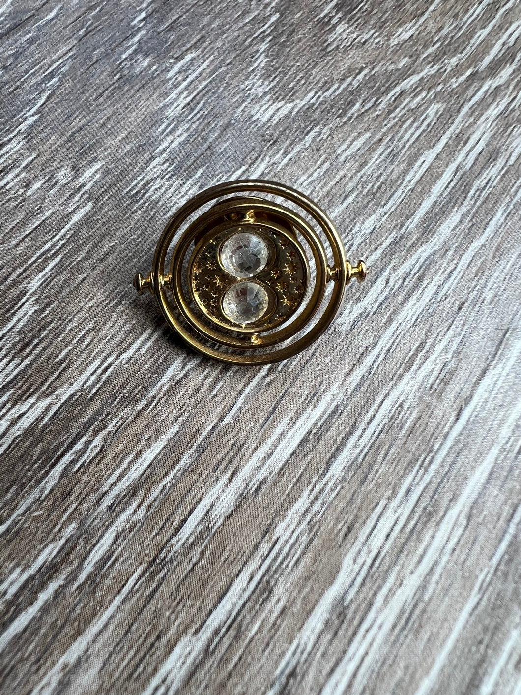 Time turner pin