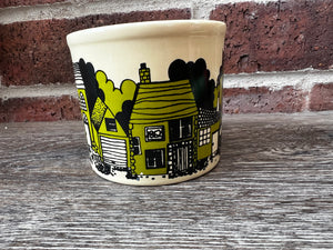 Vintage green houses mug