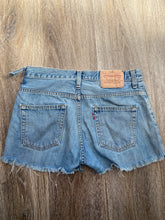 Load image into Gallery viewer, Distressed Levi’s shorts (W31)